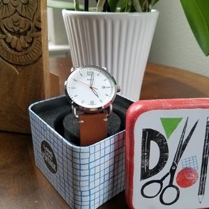 Large Fossil watch with metal tin